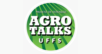 Selo do projeto Agro Talks. O selo é redondo, com fundo em duas tonalidades de verde, no formato como se fossem raios de sol. O texto no selo é: "Porjeto de Extensão Agro Talks UFFS"